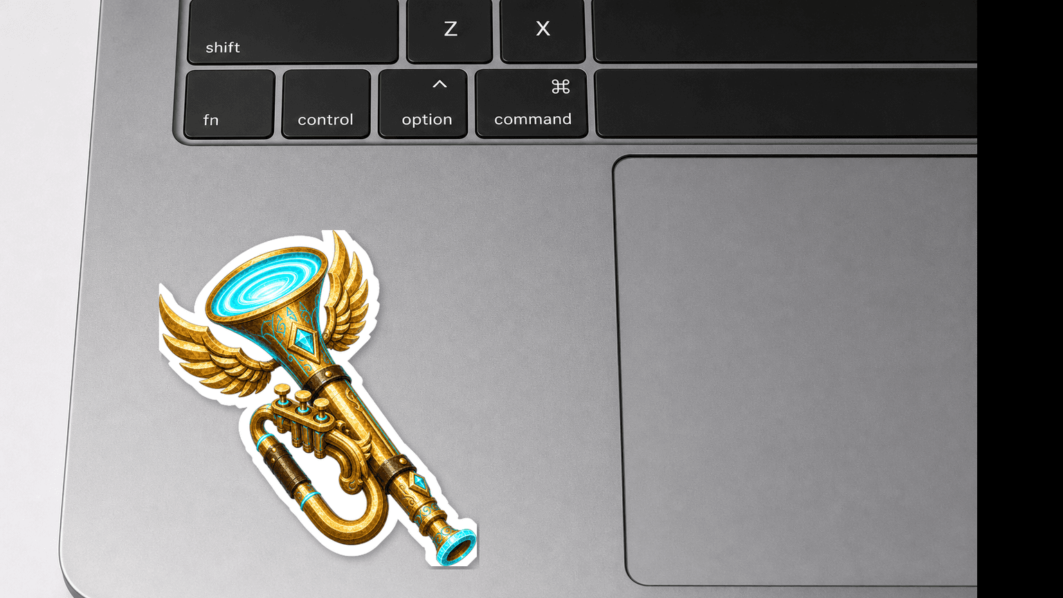 Stormcall Horn 3-inch die-cut sticker on a MacBook palm rest